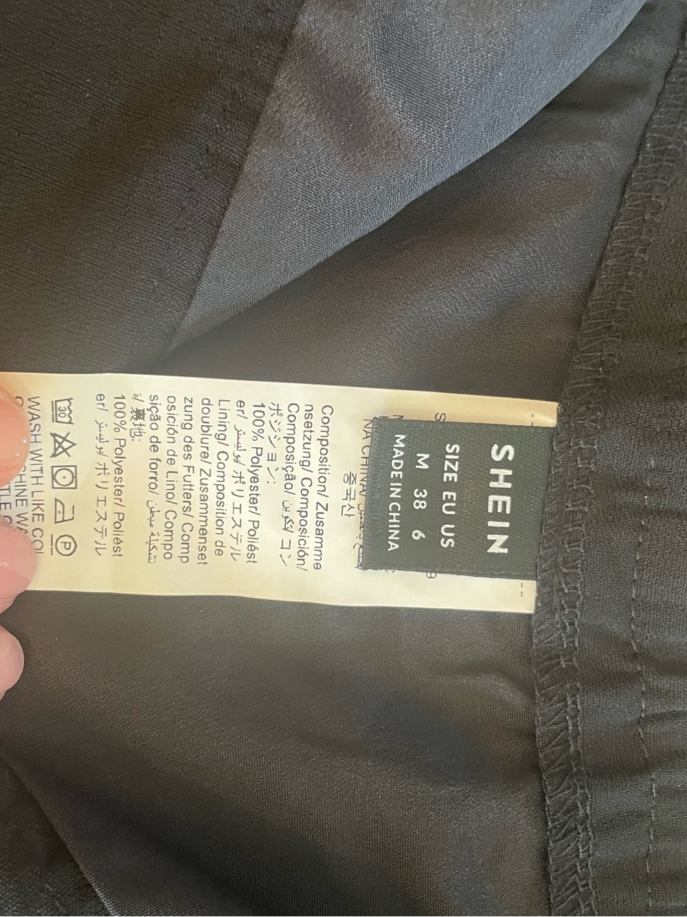 SHEIN Black Top with Label Detail